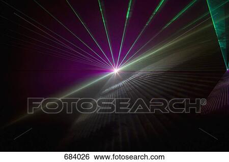 Stock Photograph - Multi colored laser lights. Fotosearch