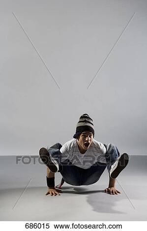 Stock Photography - A B-boy doing a Crab breakdance move. Fotosearch