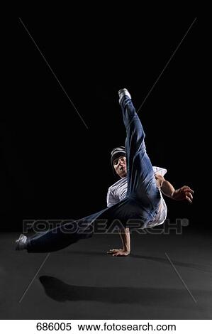 A B-boy doing a Flare breakdance move View Large Photo Image Stock Photography - A B-boy doing a Flare breakdance move. Fotosearch