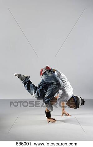 A B-boy doing a Freeze breakdance move View Large Photo Image Stock Image - A B-boy doing a Freeze breakdance move. Fotosearch