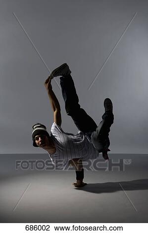 A B-boy doing a L-Kick breakdance move View Large Photo Image Stock Image - A B-boy doing a L-Kick breakdance move. Fotosearch