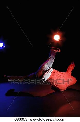 A B-boy doing a Windmill breakdance move View Large Photo Image Stock Image - A B-boy doing a Windmill breakdance move. Fotosearch