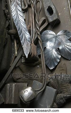 Pieces of crafted metal and metalwork tools View Large Photo Image Stock Image - Pieces of crafted metal and metalwork tools. Fotosearch