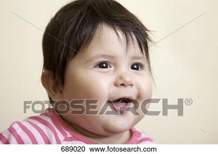 Portrait of a baby with brown hair View Large Photo Image Stock Image - Portrait of a baby with brown hair. Fotosearch