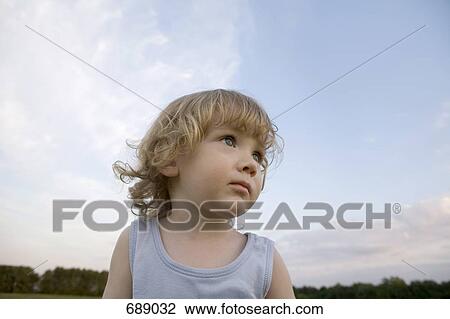 Stock Image - Portrait of a young boy. Fotosearch