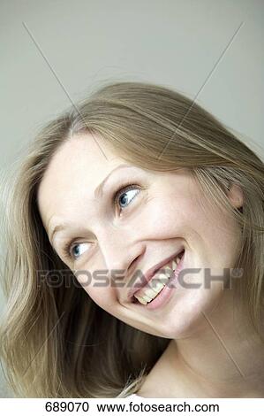 Portrait of a young woman with blond hair View Large Photo Image Stock Image - Portrait of a young woman with blond hair. Fotosearch
