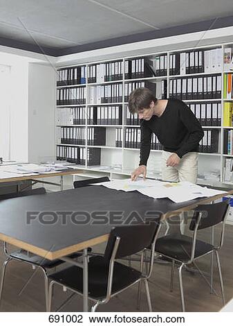 An architect in his office View Large Photo Image Stock Image - An architect in his office. Fotosearch