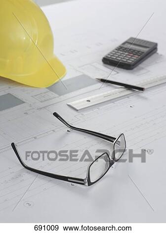 Architectural plan with objects on top View Large Photo Image Stock Photo - Architectural plan with objects on top. Fotosearch