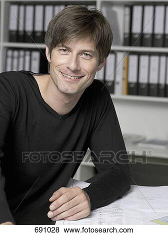 Stock Photo - Portrait of an architect. Fotosearch