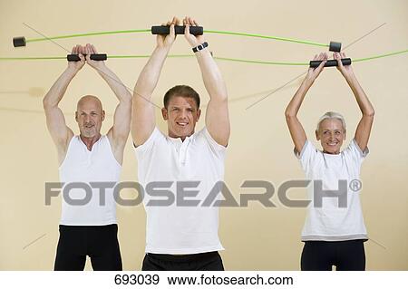 A fitness instructor teaching a aerobic flex bar class View Large Photo Image Stock Photo - A fitness instructor teaching a aerobic flex bar class. Fotosearch