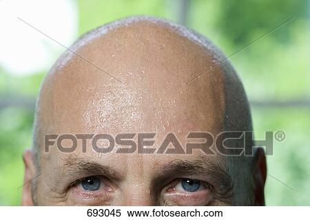 A mature man sweating, high section View Large Photo Image Stock Photography - A mature man sweating, high section. Fotosearch