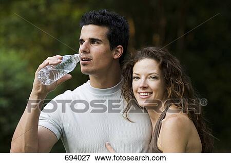 Stock Photo - Portrait of a young couple. Fotosearch