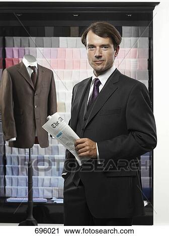 A man in a tailor's studio View Large Photo Image Stock Image - A man in a tailor's studio. Fotosearch