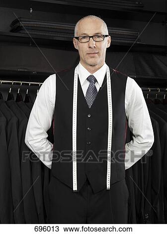 Portrait of a tailor View Large Photo Image Stock Image - Portrait of a tailor. Fotosearch