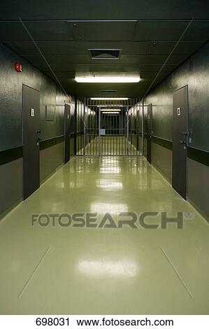 An empty prison corridor View Large Photo Image Stock Image - An empty prison corridor. Fotosearch
