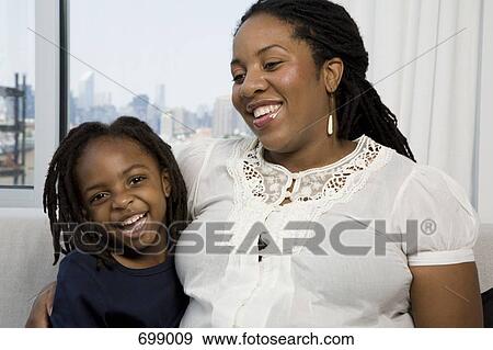 A mother and son laughing View Large Photo Image Stock Photo - A mother and son laughing. Fotosearch