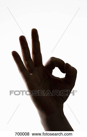 A hand making an OK sign View Large Photo Image Stock Photo - A hand making an OK sign. Fotosearch