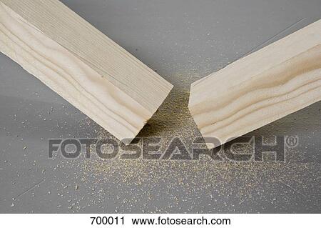 A plank of wood cut in half View Large Photo Image Stock Image - A plank of wood cut in half. Fotosearch