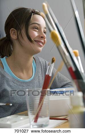 A young girl in a pottery studio View Large Photo Image Stock Photo - A young girl in a pottery studio. Fotosearch