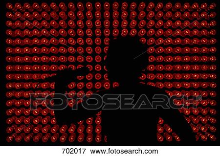 Silhouette of a singer in front of red lights View Large Photo Image Stock Photo - Silhouette of a singer in front of red lights. Fotosearch