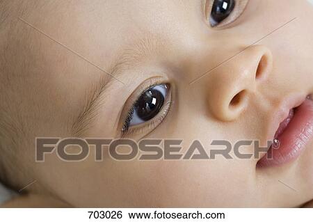 Portrait of a baby girl, close-up View Large Photo Image Stock Photograph - Portrait of a baby girl, close-up. Fotosearch