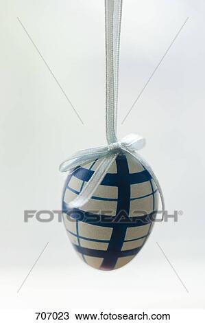 A decorative egg hanging View Large Photo Image Stock Image - A decorative egg hanging. Fotosearch