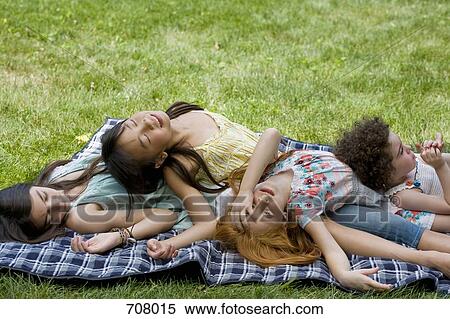 Four girls lying on top of each other View Large Photo Image Stock Photography - Four girls lying on top of each other. Fotosearch