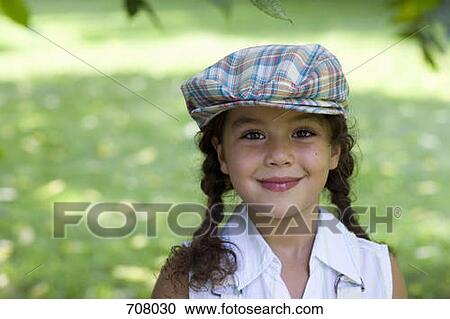 Portrait of young girl, outdoors View Large Photo Image Stock Image - Portrait of young girl, outdoors. Fotosearch