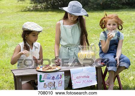 Three girls with a lemonade stand View Large Photo Image Stock Image - Three girls with a lemonade stand. Fotosearch