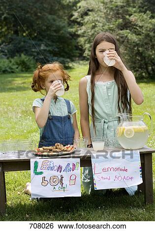 Two girls with a lemonade stand View Large Photo Image Stock Photograph - Two girls with a lemonade stand. Fotosearch