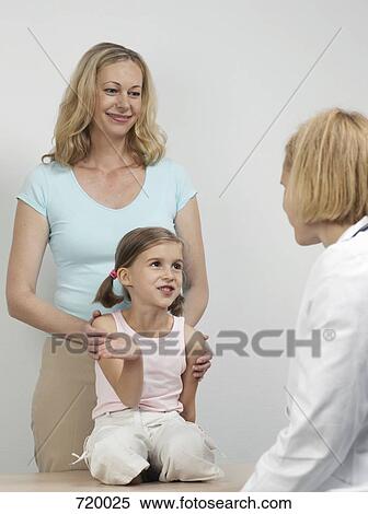 A mother and daughter at medical exam with a pediatrician View Large Photo Image Stock Photography - A mother and daughter at medical exam with a pediatrician. Fotosearch