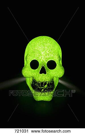 Stock Image - A green skull. Fotosearch