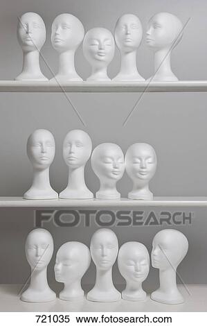 Stock Photography - Mannequin busts on shelves. Fotosearch