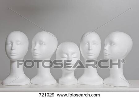 Stock Photo - Mannequins on a shelf. Fotosearch