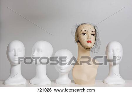 Mannequins on a shelf View Large Photo Image Stock Photograph - Mannequins on a shelf. Fotosearch