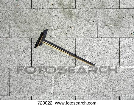 A broom lying on the floor View Large Photo Image Stock Image - A broom lying on the floor. Fotosearch