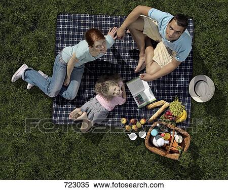 Stock Photography - A family having a picnic. Fotosearch