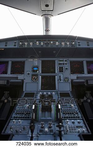 Stock Photography - The cockpit of a commercial airplane. Fotosearch
