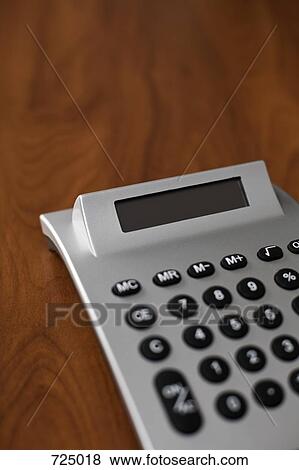 A calculator View Large Photo Image Stock Photo - A calculator. Fotosearch