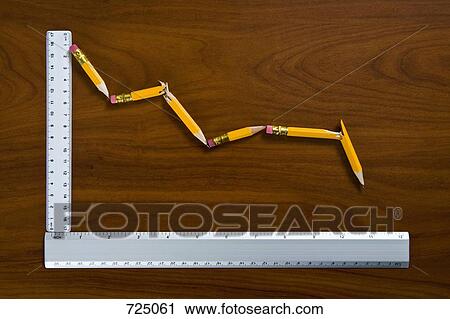 A line graph showing decline made from pencils and rulers View Large Photo Image Stock Image - A line graph showing decline made from pencils and rulers. Fotosearch