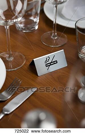A No Smoking sign on a dining table View Large Photo Image Stock Image - A No Smoking sign on a dining table. Fotosearch