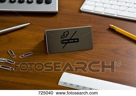 No smoking sign on an office desk View Large Photo Image Stock Image - No smoking sign on an office desk. Fotosearch