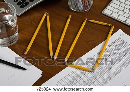 Pencils on a desk arranged to spell No View Large Photo Image Picture - Pencils on a desk arranged to spell No. Fotosearch