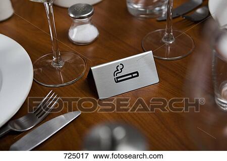 Smoking sign on a dining table View Large Photo Image Stock Photo - Smoking sign on a dining table. Fotosearch