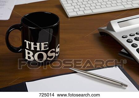 The Boss mug on a desk View Large Photo Image Picture - The Boss mug on a desk. Fotosearch
