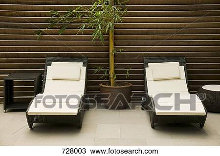 Stock Image - Two lounge chairs. Fotosearch