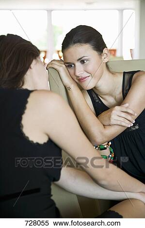 Two women bonding together View Large Photo Image Stock Photography - Two women bonding together. Fotosearch