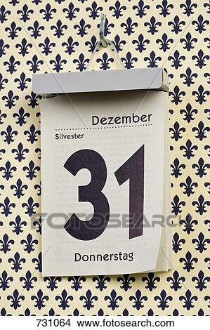 Picture - A German daily calendar set on New Year's Eve. Fotosearch