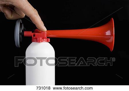 A human finger using an air horn View Large Photo Image Stock Photo - A human finger using an air horn. Fotosearch