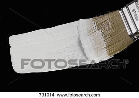 A paintbrush painting a white strip View Large Photo Image Picture - A paintbrush painting a white strip. Fotosearch